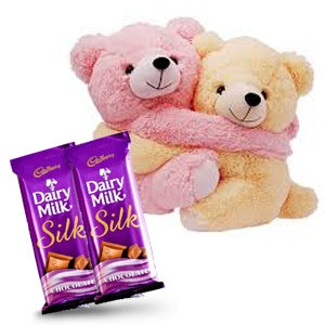 Love Duets: Hugging Teddies and Dairy Milk Silk Chocolates Love Duets: Hugging Teddies and Dairy Milk Silk Chocolates