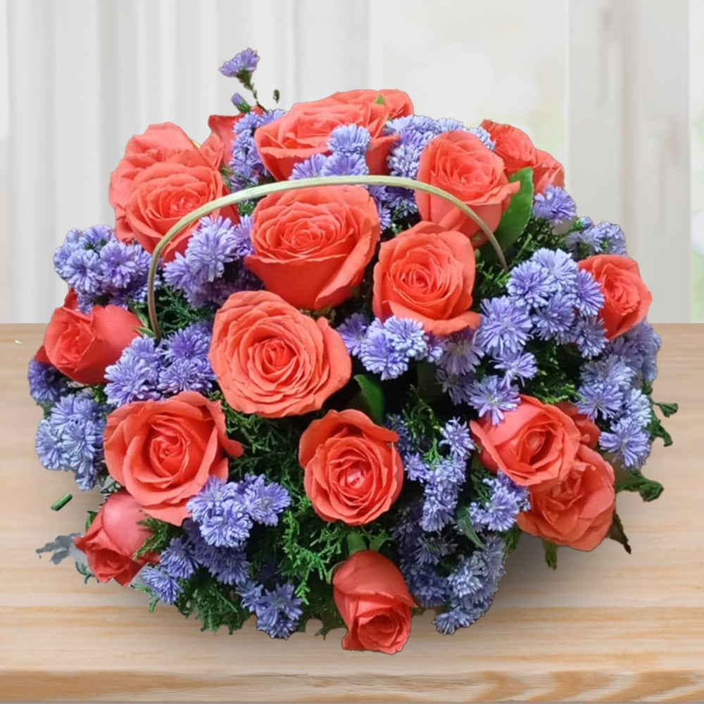 Stunning Orange Roses and Blue Daisy Basket