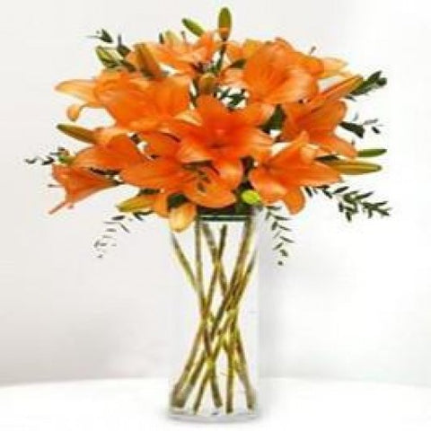 Harvest Hues: Breathtaking 10 Orange Lilies in a Glass Vase - A Taste of Autumn